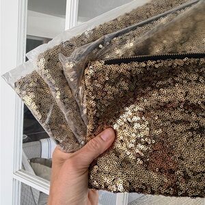 NWT Gold Sequin Pouch Set of 4